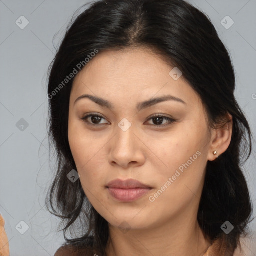 Joyful asian young-adult female with long  brown hair and brown eyes