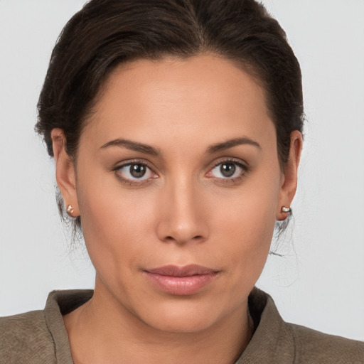 Neutral white young-adult female with short  brown hair and brown eyes