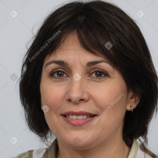 Joyful white adult female with medium  brown hair and brown eyes