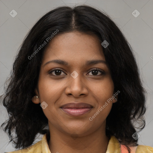 Joyful black young-adult female with medium  brown hair and brown eyes