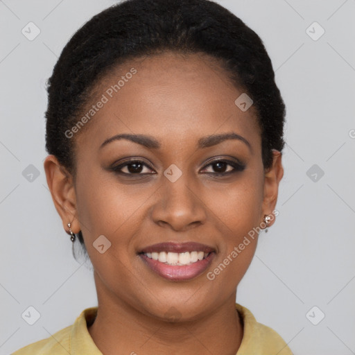 Joyful black young-adult female with short  brown hair and brown eyes