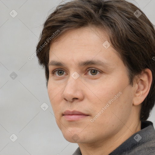 Neutral white adult male with short  brown hair and brown eyes