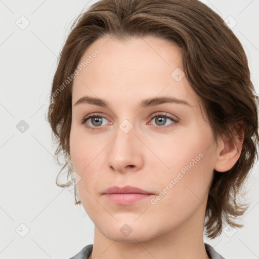 Neutral white young-adult female with medium  brown hair and grey eyes