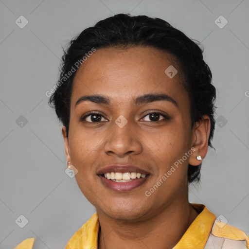 Joyful latino young-adult female with short  black hair and brown eyes