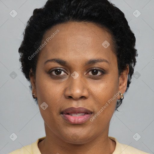 Joyful latino adult female with short  black hair and brown eyes