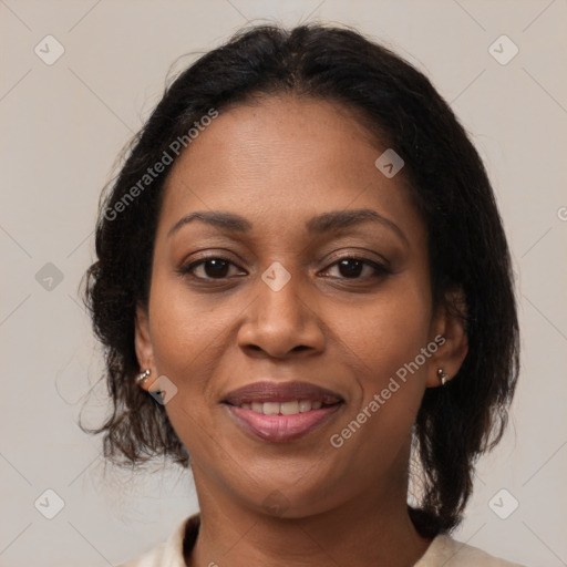 Joyful black young-adult female with medium  brown hair and brown eyes