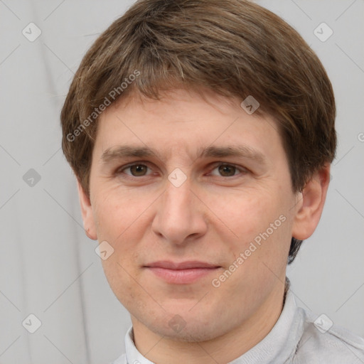 Joyful white adult male with short  brown hair and brown eyes