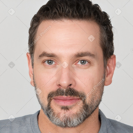 Neutral white adult male with short  brown hair and brown eyes