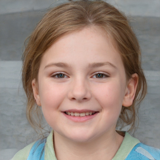 Joyful white child female with medium  brown hair and blue eyes