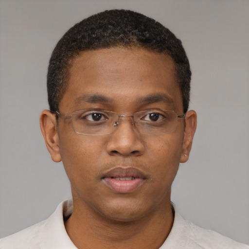 Neutral black young-adult male with short  brown hair and brown eyes