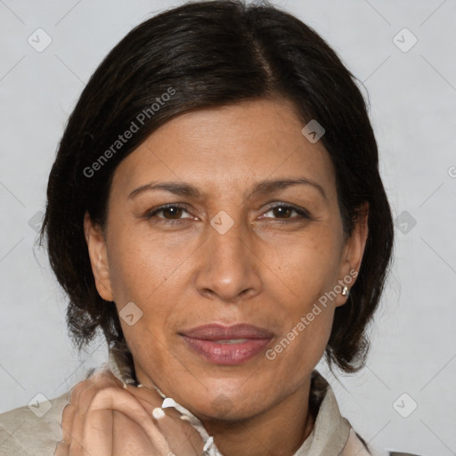 Joyful white adult female with medium  brown hair and brown eyes