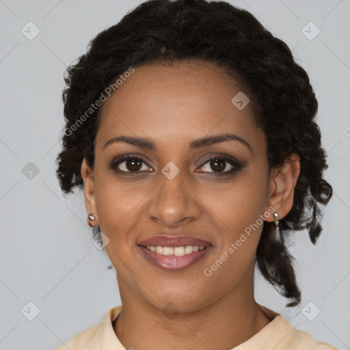 Joyful black young-adult female with medium  brown hair and brown eyes