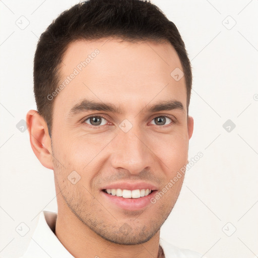 Joyful white young-adult male with short  brown hair and brown eyes