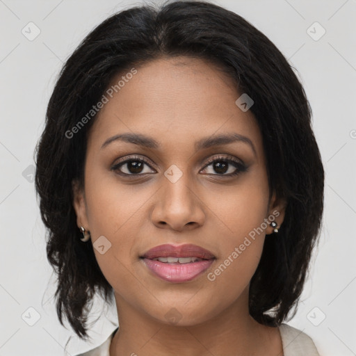 Joyful latino young-adult female with medium  brown hair and brown eyes