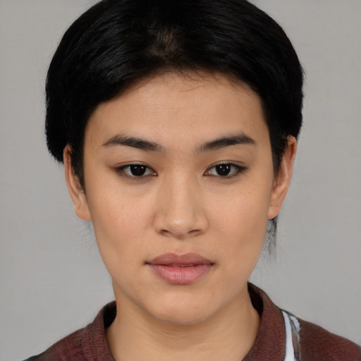Neutral asian young-adult female with medium  black hair and brown eyes