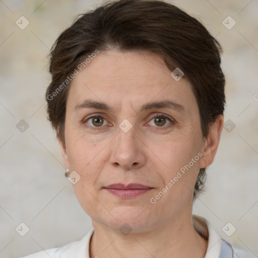 Joyful white adult female with short  brown hair and brown eyes