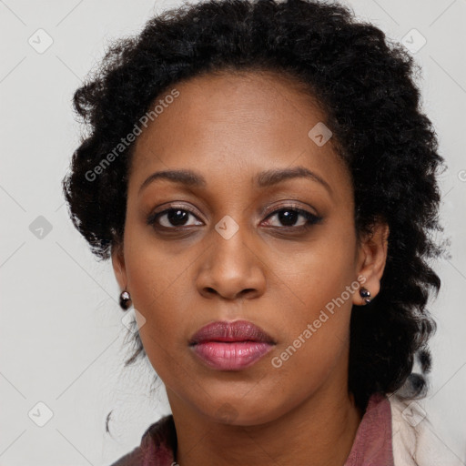 Neutral black young-adult female with long  brown hair and brown eyes