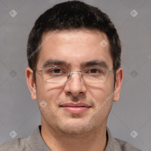 Joyful white adult male with short  brown hair and brown eyes