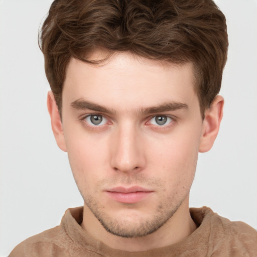 Neutral white young-adult male with short  brown hair and grey eyes