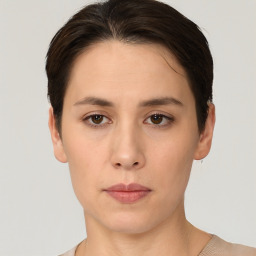 Neutral white young-adult female with short  brown hair and brown eyes