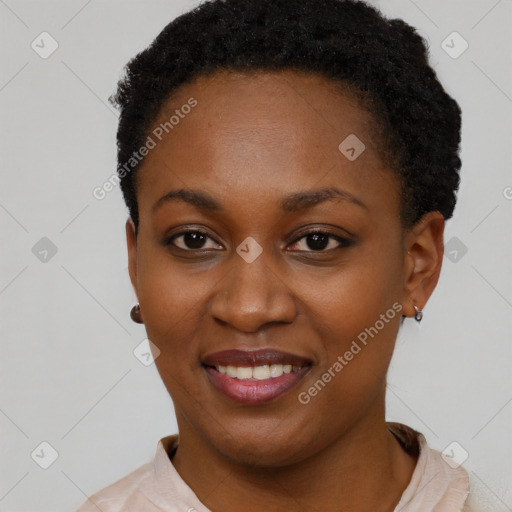 Joyful black young-adult female with short  black hair and brown eyes