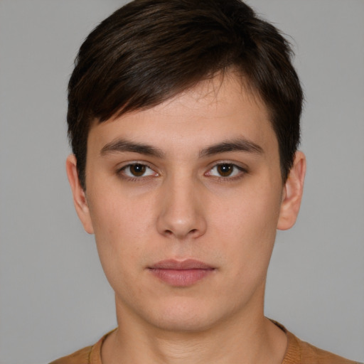 Neutral white young-adult male with short  brown hair and brown eyes