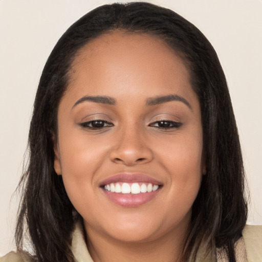 Joyful white young-adult female with long  black hair and brown eyes