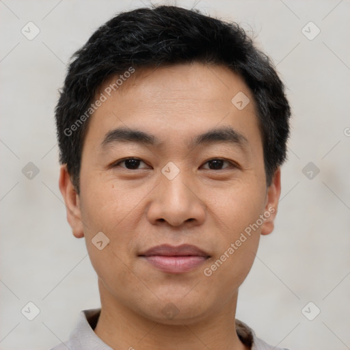 Joyful white young-adult male with short  black hair and brown eyes