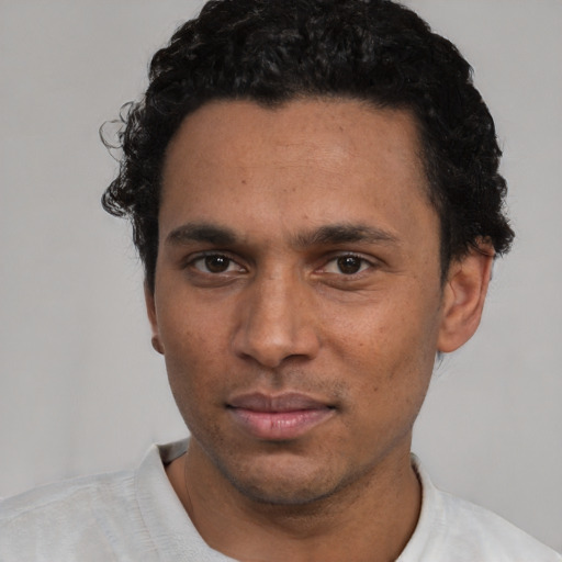 Neutral white adult male with short  black hair and brown eyes