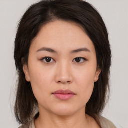 Neutral asian young-adult female with medium  brown hair and brown eyes