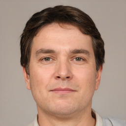 Neutral white adult male with short  brown hair and grey eyes