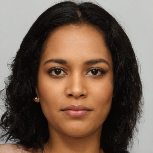 Neutral latino young-adult female with long  black hair and brown eyes