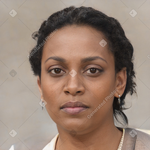 Neutral black young-adult female with short  brown hair and brown eyes