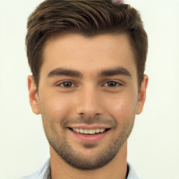 Joyful white young-adult male with short  brown hair and brown eyes