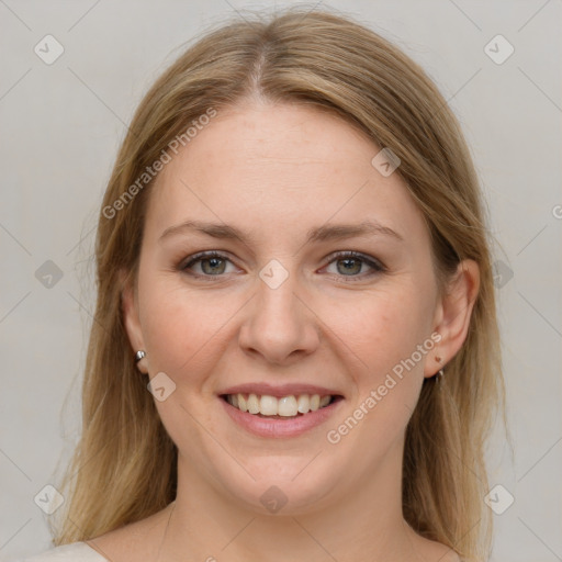 Joyful white young-adult female with medium  brown hair and grey eyes