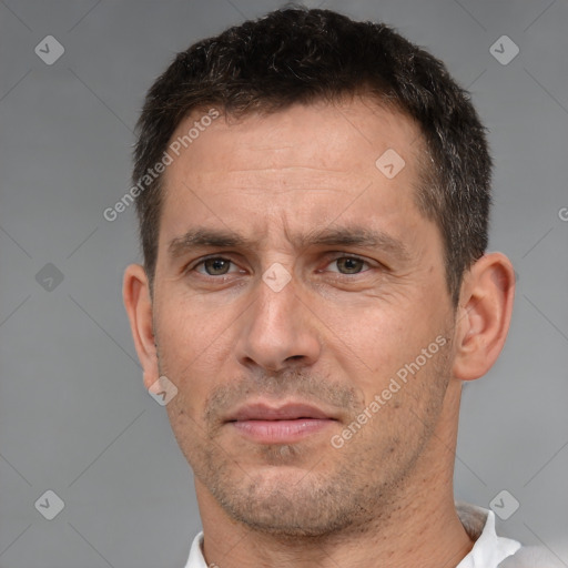 Neutral white adult male with short  brown hair and brown eyes