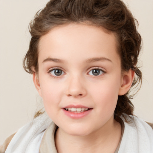 Joyful white child female with medium  brown hair and brown eyes