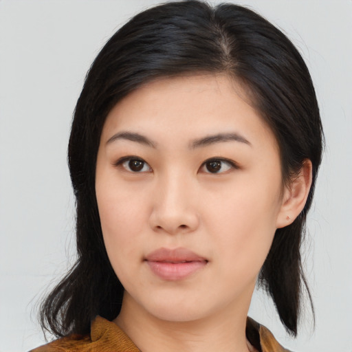 Neutral asian young-adult female with medium  black hair and brown eyes