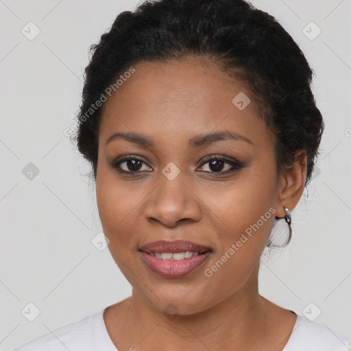 Joyful latino young-adult female with short  black hair and brown eyes