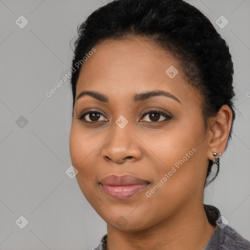 Joyful latino young-adult female with long  brown hair and brown eyes