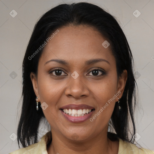 Joyful black young-adult female with medium  brown hair and brown eyes