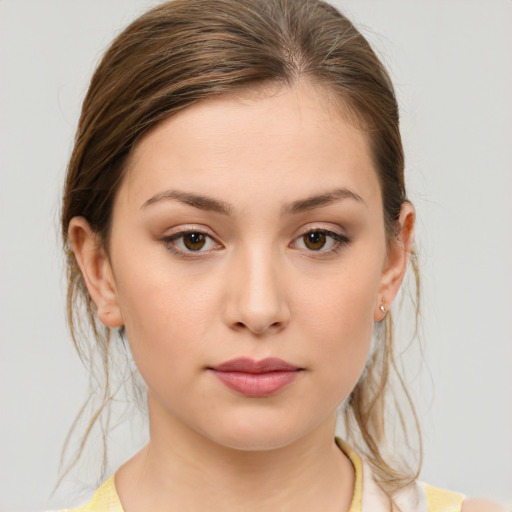 Neutral white young-adult female with medium  brown hair and brown eyes