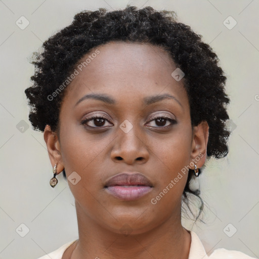 Neutral black young-adult female with short  brown hair and brown eyes