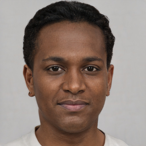 Neutral black young-adult male with short  black hair and brown eyes