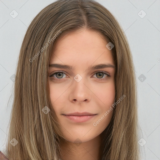 Neutral white young-adult female with long  brown hair and brown eyes