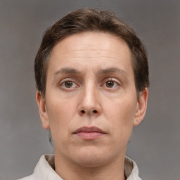 Neutral white adult male with short  brown hair and brown eyes