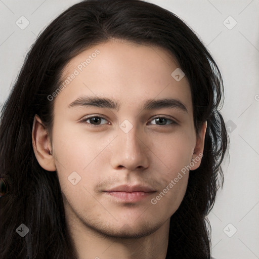 Neutral white young-adult male with long  brown hair and brown eyes