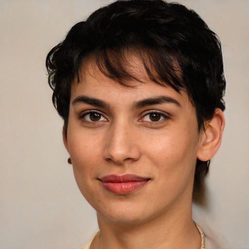 Joyful latino young-adult female with short  brown hair and brown eyes