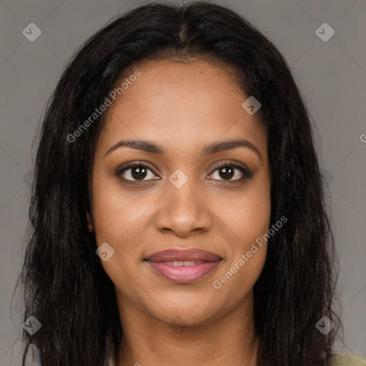 Joyful black young-adult female with long  brown hair and brown eyes