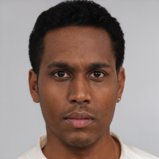 Neutral black young-adult male with short  black hair and brown eyes